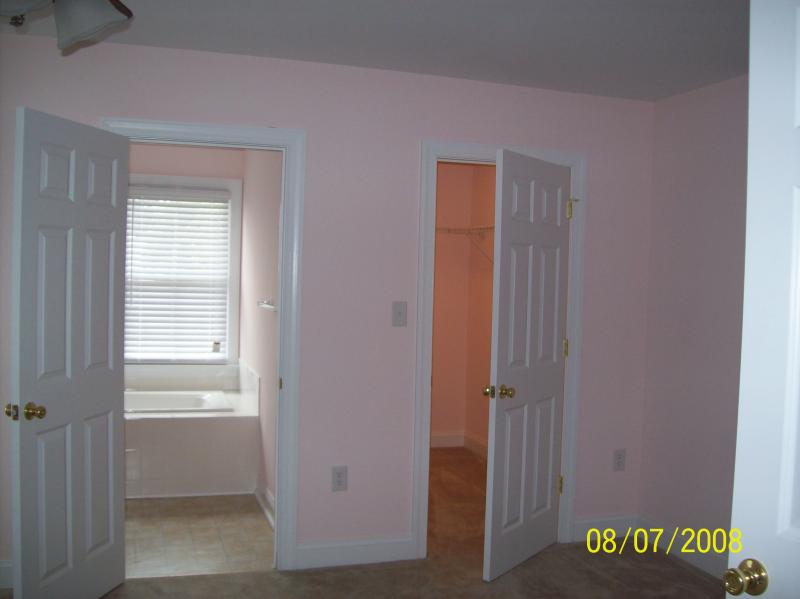 Master bedroom with private bath and walk-in closet